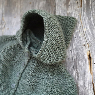 Raunioiset Onesie, suomenkielinen neuleohje